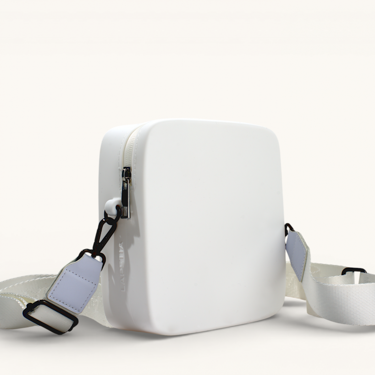 White Mini Quad silicone bag side profile with adjustable matching strap